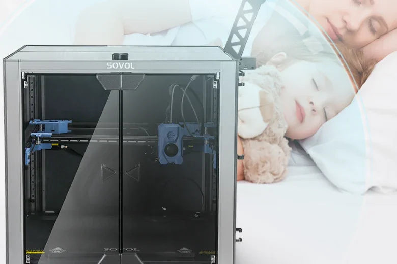Sovol enclosed 3D printer in front of a sleeping mother and child with a teddy bear