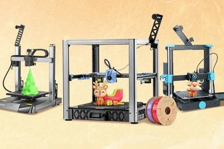 Three Sovol 3D printers printing holiday-themed objects on a beige background